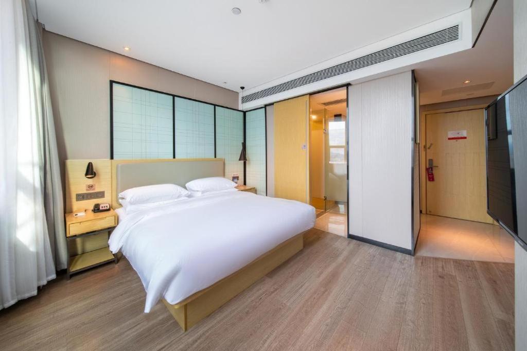 Echarm Hotel Yangjiang Baili Plaza Exterior photo