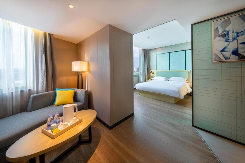 Echarm Hotel Yangjiang Baili Plaza Exterior photo