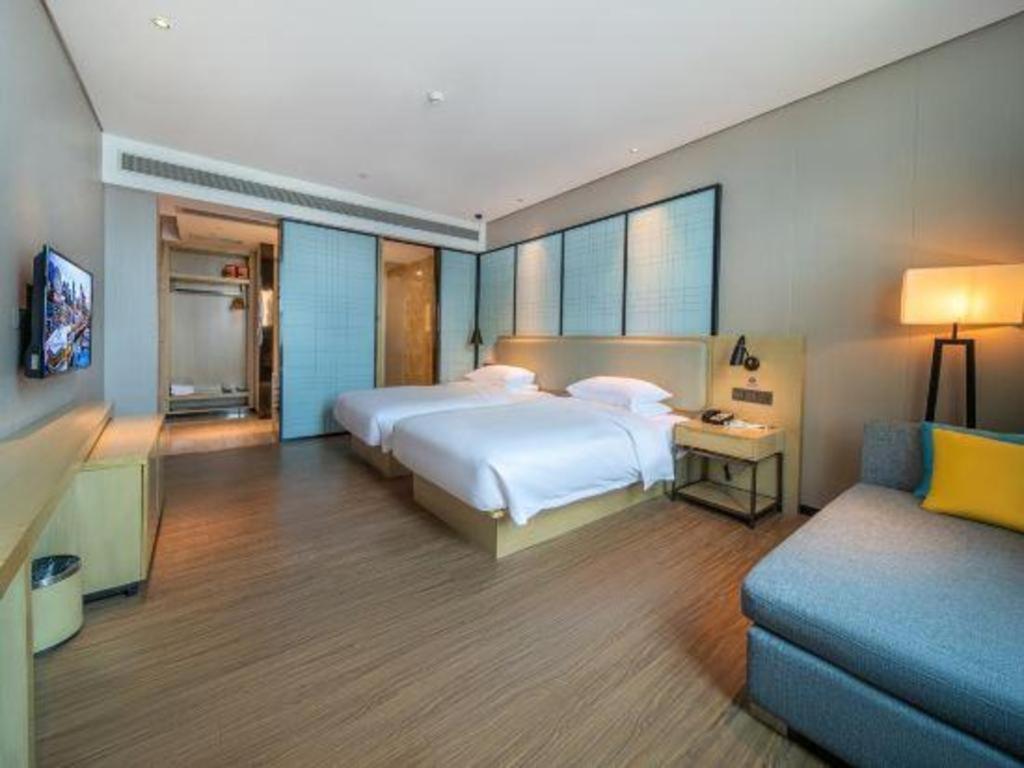 Echarm Hotel Yangjiang Baili Plaza Exterior photo