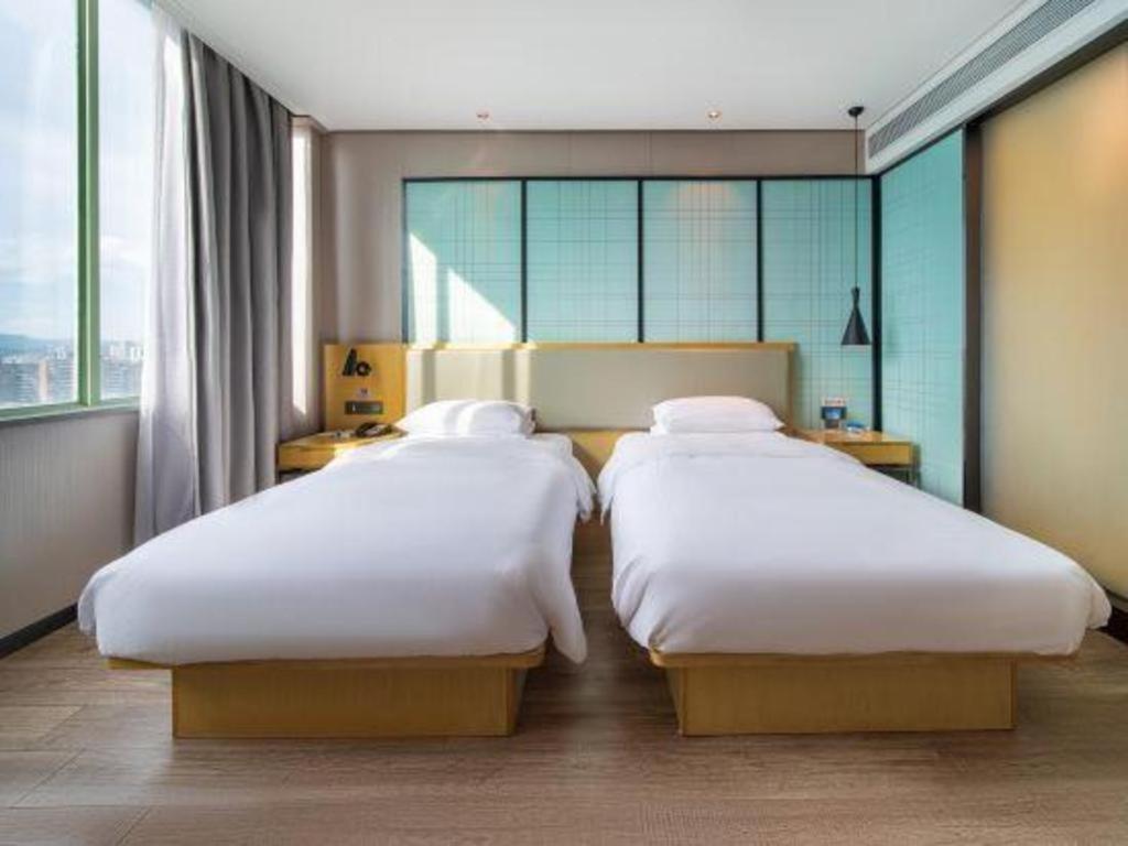 Echarm Hotel Yangjiang Baili Plaza Exterior photo