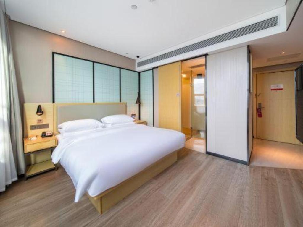 Echarm Hotel Yangjiang Baili Plaza Exterior photo