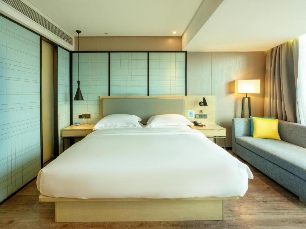 Echarm Hotel Yangjiang Baili Plaza Exterior photo