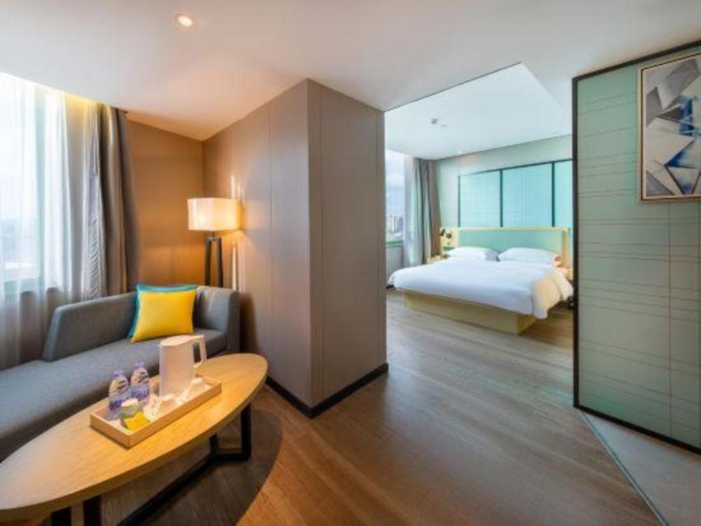 Echarm Hotel Yangjiang Baili Plaza Exterior photo