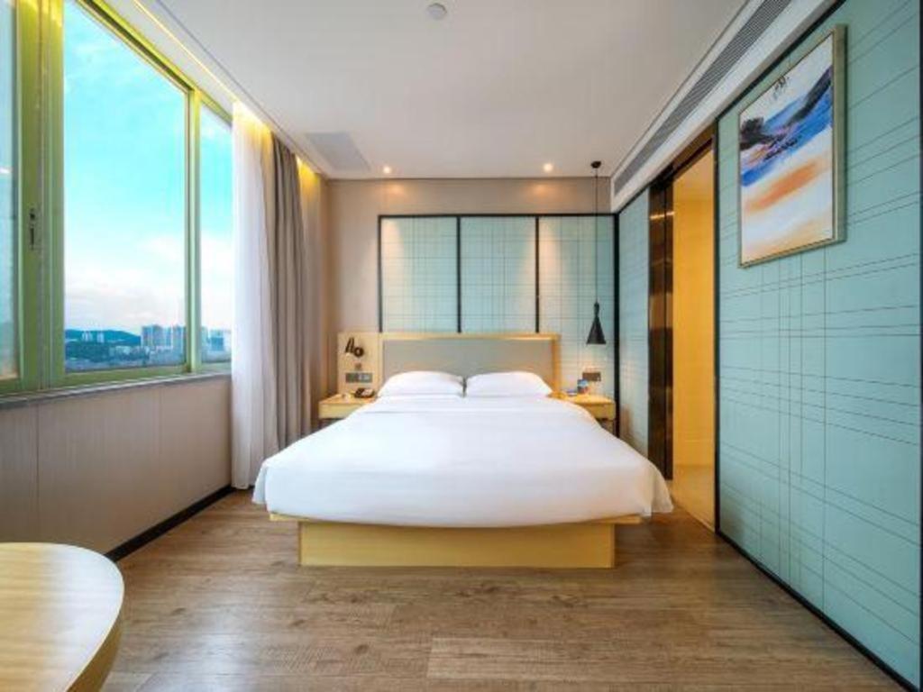 Echarm Hotel Yangjiang Baili Plaza Exterior photo