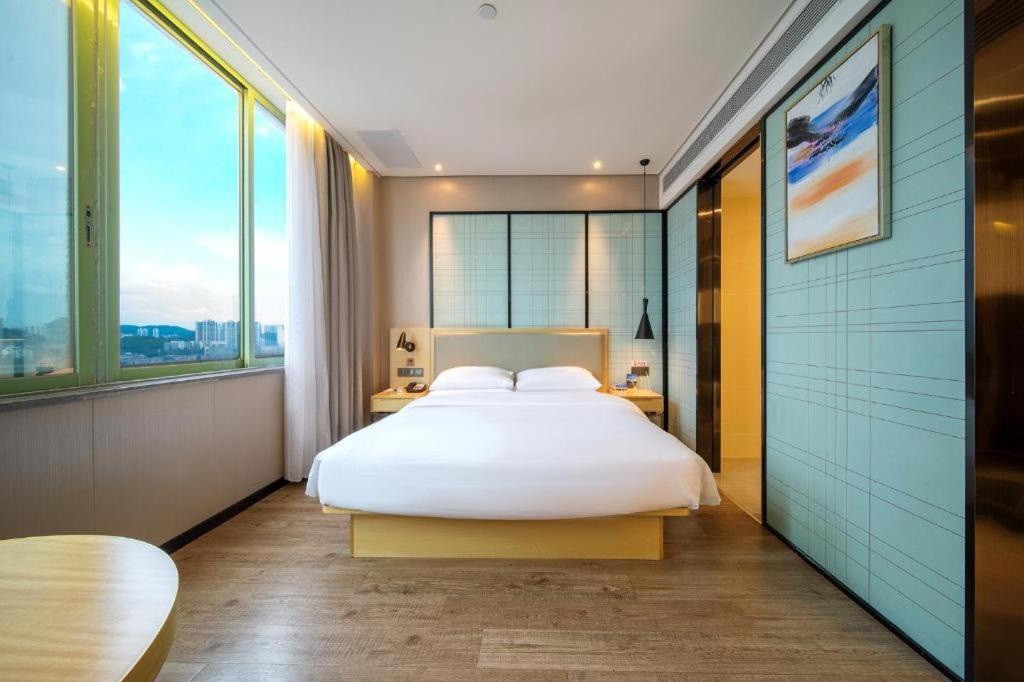 Echarm Hotel Yangjiang Baili Plaza Exterior photo