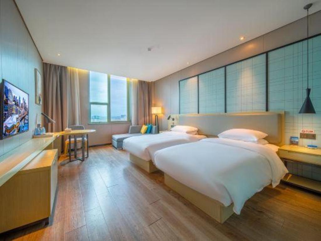 Echarm Hotel Yangjiang Baili Plaza Exterior photo
