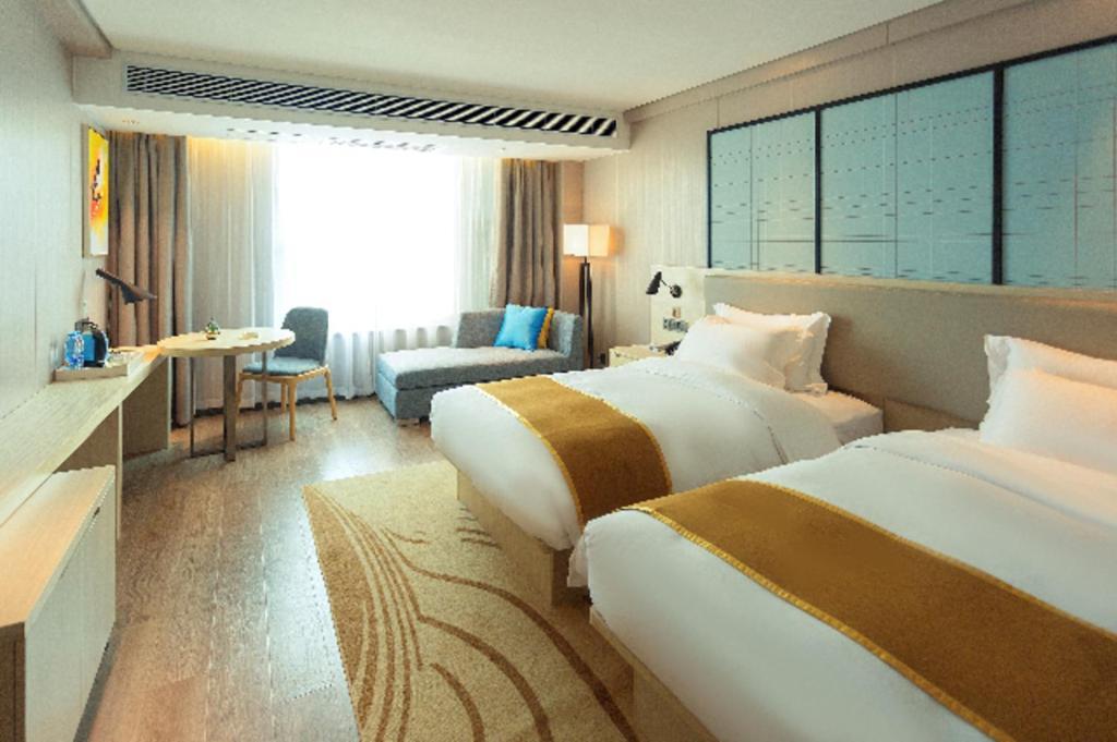 Echarm Hotel Yangjiang Baili Plaza Exterior photo